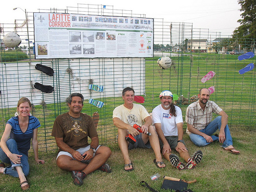 Volunteers take a break after installing information panel in Lafitte Corridor. Photo courtesy of the Urban Conservancy.